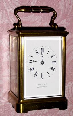 C.1900, French, Brass Cased carriage clock, full size, in a Corniche case, the dial signed by the retailer, Duhme and Co., Cincinnati. — Antique Clocks Price Guide