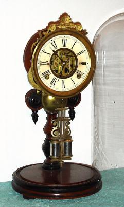 C.1875, Probably Henry J. Davies (for Ansonia), Single Post Crystal Palace, 8-day time and strike under glass dome. — Antique Clocks Price Guide