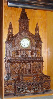 C.1900, American, Large Fretwork Clock, with a Connecticut balance/ lever movement of unknown duration, in a modern display / travel case with glass front and 110v overhead fluorescent lighting. — Antique Clocks Price Guide