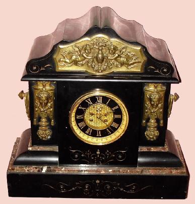 C.1890, French, Black Slate and Bronze mantel clock, 8-day time and gong strike, with open escapement on the dial. — Antique Clocks Price Guide