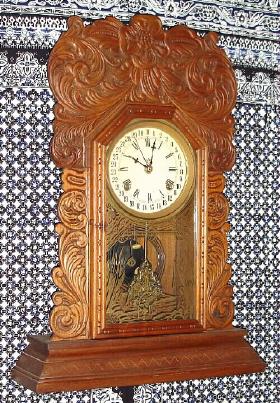 C.1903, Waterbury Clock Co., "Brighton", 8-day time and gong strike, simple calendar clock. — Antique Clocks Price Guide