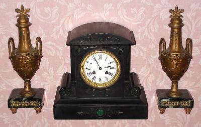 C.1900, French, Marti and Cie, , 8-day time/strike black marble mantel clock with a pair of urns. — Antique Clocks Price Guide