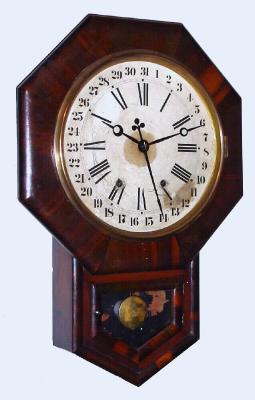 C.1906, Ansonia Clock Co., "12-inch Drop Octagon - R.C. Calendar", 8-day time and bell strike calendar wall clock. — Antique Clocks Price Guide
