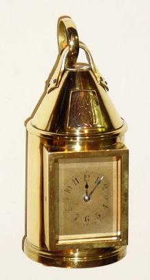 C.1900, French for Tiffany and Co., NY, lantern shaped timepiece, jeweled lever movement, with a silver plaque bearing the initials CES, and with a compass in the top. — Antique Clocks Price Guide