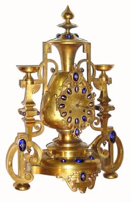 C.1890, French, Guyenot a'Paris, unusual fantasy clock, with many blue enamel decorations, and with cups right and left that can be used as candle holders. — Antique Clocks Price Guide