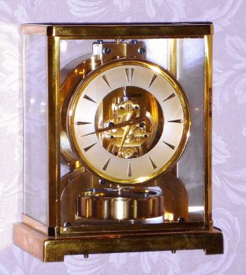 C.1957, Swiss, LeCoultre, ATMOS,  serial No. 78549, brass and glass perpetual motion clock, wound by changes in temperature and pressure. — Antique Clocks Price Guide