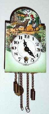 C.1930's, German, 30-hour pendulette novelty wall timepiece with Little Red Riding Hood on the arch. — Antique Clocks Price Guide