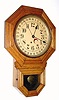 C.1915, E. Ingraham and Co., Bristol., Conn., "Ingot", oak short drop octagon model with calendar, 8-day timepiece. 