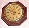 C.1880, E. Ingraham and Co., "Octagon Lever", 30-hour wall timepiece. 