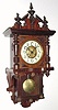 C.1900, German, Behrens, Gongschlag, 8-day, drop well (glazed cover), "Berliner" style wall clock with original top. 