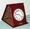 C.1900, Swiss for J. E. Caldwell and Co., 8-Day Quarter Repeating travel clock, in a maroon leather folding travel case. 