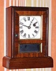 C.1881, Seth Thomas Clock Co., "Cottage R", 30-hour rosewood cottage timepiece. 