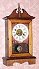 C.1890, William L. Gilbert CHROMO TIME, cottage clock with broken arch scroll top, 30 hour time and alarm. 