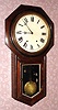 C.1906, Ansonia Clock Co., "Regulator A", 8-day time and strike, long drop octagon school clock. 