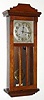 C.1920, New Haven Clock Co., 8-day time/strike mission style for the English market wall clock. We couldn't find this clock in the catalog, but the movement was made by New Haven, and is original to the case. 