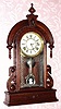 C.1881, Waterbury Clock Co., "Paris", 8-day time and strike walnut parlor clock with restoration. 