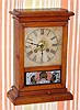 C.1890, German-American, 30-hour time/alarm cottage timepiece. This is German copy of a Waterbury Clock Co. style case. 