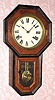 C.1910, Japanese, Short Drop Octagon school clock, 8-day time and gong strike. 