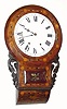 C.1890, Anglo American, 8-day time/strike carved and inlayed schoolhouse style wall clock, less bezel and glass. 