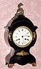 C.1900, Mixed lot: Japy Freres and Cie, good French bell strike movement, now in an American enameled iron case with metal ornaments. 