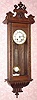 Mixed lot; a C.1890 Lenzkirch movement, now in a new case [with old bottom], with plywood back, and a door key screwed on as the hanger [never had any other kind of hanger]. 