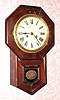 C.1910, German, 8-day time and strike European version of an American schoolhouse clock, as-found. 