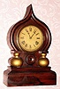 C.1875, Ingraham GRECIAN rosewood shelf clock, 8-day with good label. 
