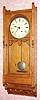C.1885, Seth Thomas, Queen Anne, 8-day wall regulator timepiece in oak. 
