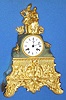 C1840, French, Ormolu and Bronze figural clock, a courtesan and his lady, in formal dress, the well made bell strike movement with silk thread suspension. 