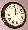 C.1840, English Dial Clock, Passing Strike, fusee movement, with bell nestled on top of the movement. 