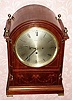 C.1906, (dated presentation), German (W+H) for Tiffany and Co, Westminster chime mantel clock in mahogany, with brass accents. 