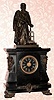 C.1890, French for Tiffany and Co, NY, a bronze and marble tribute to Johannes Gensfleisch zur Laden zum Gutenberg, a quarter chime clock playing Westminster tune on 4 bells suspended beneath the "siamese" style movement. 