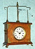 C.1885, Jerome and Co., (New Haven Clock Co.). "Flying Pendulum No. 1" novelty timepiecein oak. Also known as "Ignatz" clock. 
