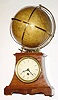 C.1900, German for the English Market, Terrestrial Globe, World Time Clock, 30-hour, all drawings/ indications in English. 