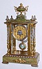 C.1900, French, Onyx and Ormolu, 4-Glass crystal regulator with multi color cloisonne enamel and portrait pendulum with brilliant surround. 
