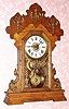 C.1900, Seth Thomas Clock Co., "Metals No. 1", 8-day time/strike/alarm gingerbread clock. 