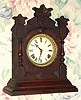 C.1894, Ansonia Clock Co., "Tivoli", 8-day time and gong strike cabinet model mantel clock. 