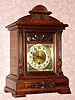 C.1905, German, Junghans, Westminster chime bracket clock in walnut with composite dial, with Nouveau spandrels. 