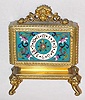 C.1900, French, Pons, Fancy Enameled boudoir or desk timepiece, ormolu, with dragon tongue feet and a dragon mask at the top. 