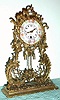 C.1930, German, Wintermantel Gebruder, 30-hour pendulette, cast novelty table timepiece. 