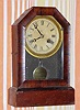 C.1875, Terry Clock Co., Waterbury, Conn., 30-hour rosewood cottage timepiece. 