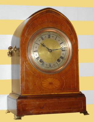 C.1900, German, Winterhalder and Hofmeier, lancet top, quarter striking bracket clock, with brass feet and side handles, silvered dial, 8-day. — Antique Clocks Price Guide