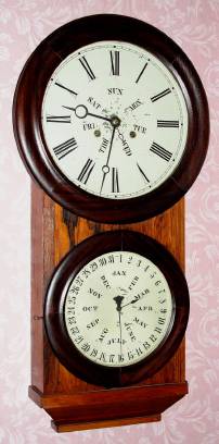 C.1865, L.F. and W.W. Carter, 8-day, 2-weight calendar wall timepiece with a B. B. Lewis calendar mechanism. — Antique Clocks Price Guide