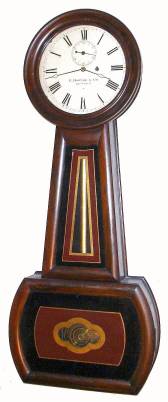 C.1890, E. Howard and Co., Boston, "No. 1 Banjo" , eight day wall clock in a fruitwood case with rosewood graining, complete with original factory label. — Antique Clocks Price Guide