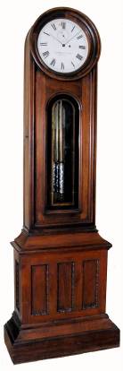 C.1875, E. Howard and Co., "Regulator No. 12", wall clock in walnut, with a C.1875 purpose made special order base, that allows the clock to stand as a floor clock (May still be displayed as a wall model; hanger is still in place, as is the original bottom, which nests into the base. — Antique Clocks Price Guide