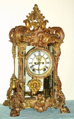 C.1905, Ansonia Clock Co., "REGAL" , Gilt bronze crystal regulator, 8-day time and strike with exposed escapement. — Antique Clocks Price Guide