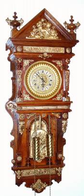 C.1890, Ansonia Clock Co "ANTIQUE HANGING", in an oak case with profuse gilt bronze trim, 2-weight, 8-day. — Antique Clocks Price Guide