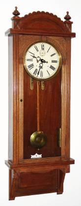C.1891, Waterbury clock Co, "Regulator No. 3" in oak, 2-weight, wall timepiece, 8-day with dead beat escapement and seconds hand below 12. — Antique Clocks Price Guide