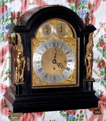C.1890, English, "Victorian Chimer", triple fusee, two tune, 9-bell, quarter chiming bracket clock, in an ebonized case with Egyptian style decorations. — Antique Clocks Price Guide