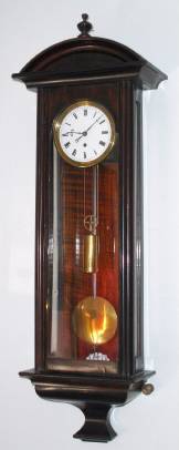 C.1840, Austrian, Weight Driven miniature timepiece, in a grained case, silk thread suspension, steel pendulum rod, 1 to 2 day, in an ebonized and faux rosewood grained case. — Antique Clocks Price Guide